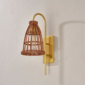 Jordan Wall Sconce in aged brass shown from the front to reveal the arm curve and shade silhouette.
