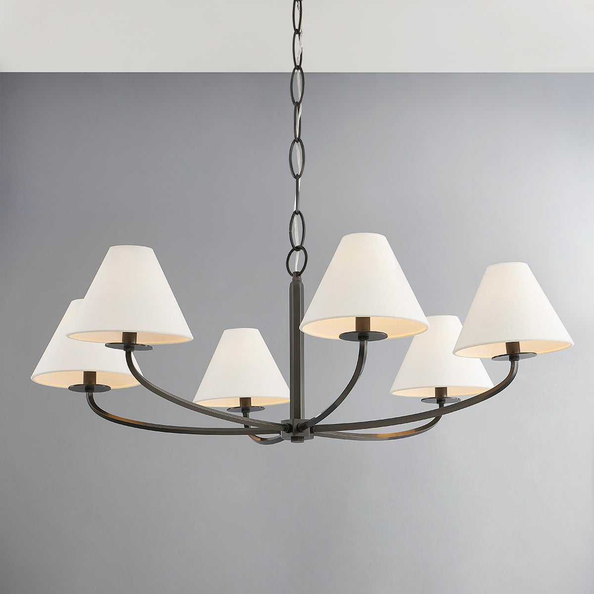 Close-up of the Stacey Chandelier 40.25" in bronze showing the frame, arms, and shade detail.