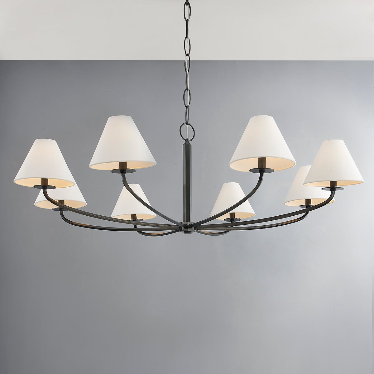 Close-up of the Stacey Chandelier 52.25" in bronze showing the frame, arms, and shade detail.