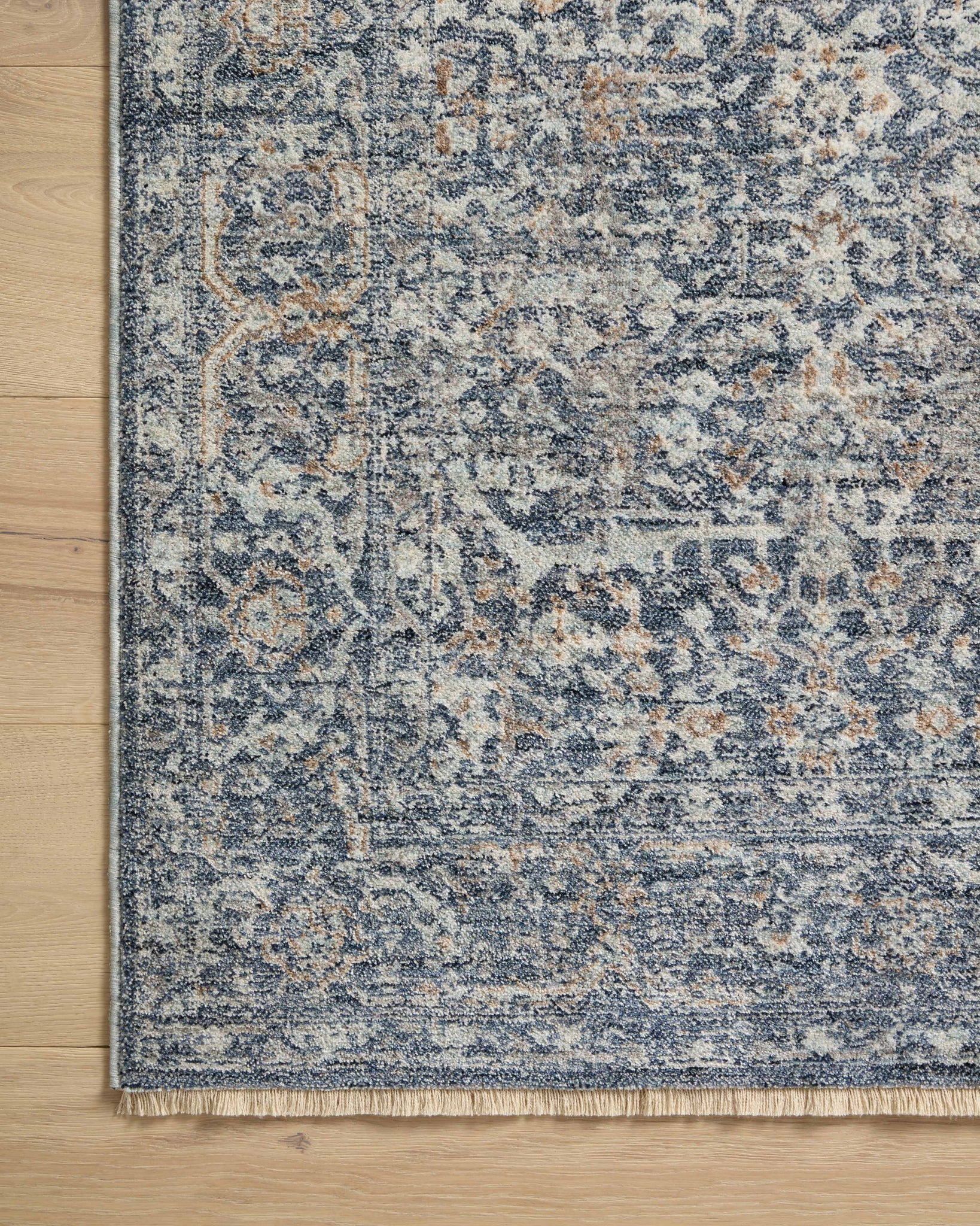 Blake Denim / Taupe shown from a different angle to reveal its pattern.