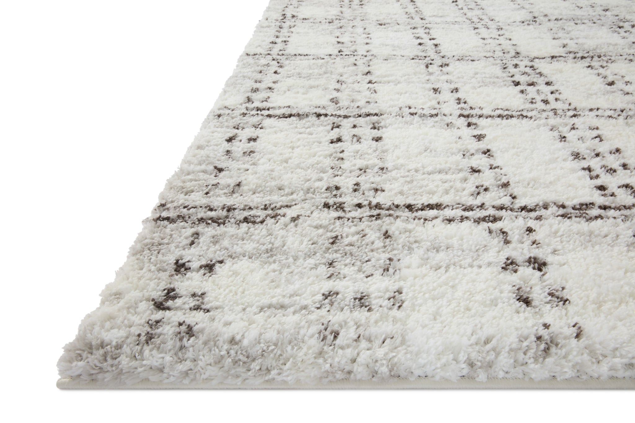 Side view of the Bliss Shag Cream / Grey rug.