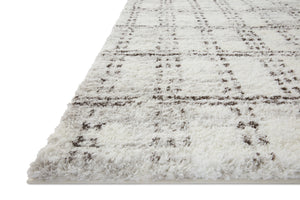 Side view of the Bliss Shag Cream / Grey rug.