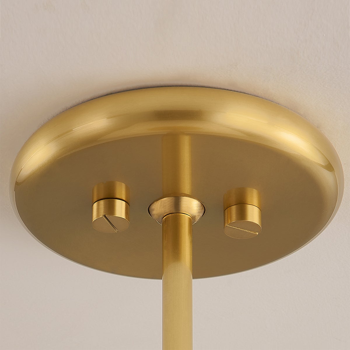 Blyford Pendant 15.5" in aged brass shown from the front to reveal the shade shape and metal detail.