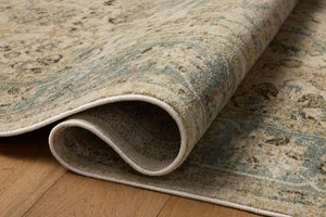 Briar Ant. Ivory / Blue shown from a different angle to reveal its pattern.