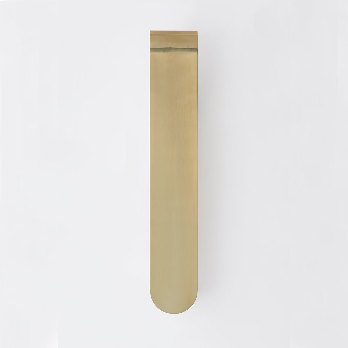 Briarwood Wall Sconce 3.75" in aged brass shown from the front to reveal the arm curve and shade silhouette.