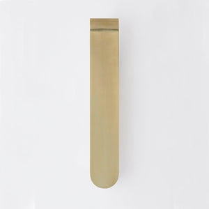 Briarwood Wall Sconce 3.75" in aged brass shown from the front to reveal the arm curve and shade silhouette.