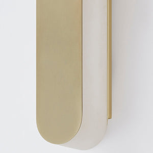 Close-up of the Briarwood Wall Sconce 3.75" in aged brass showing the arm curve and shade silhouette.
