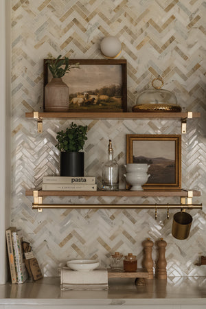 Baird Bath And Vanity 4.75" in aged brass styled in a powder room for warm, layered light at Laurie Yapp Home.