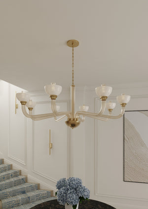 Bernard Wall Sconce in aged brass styled in a curated living room for warm, layered light at Laurie Yapp Home.