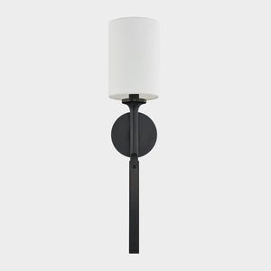 Close-up of the Brewster Wall Sconce in bronze showing the arm curve and shade silhouette.
