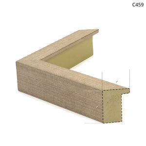 Wooden picture frame corner in a light finish, showcasing a textured design.