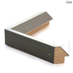 Framing sample C554 showing a modern gray and wood picture frame with angled edges.