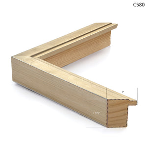 Wooden picture frame with a natural finish, showcasing a simple, modern design.