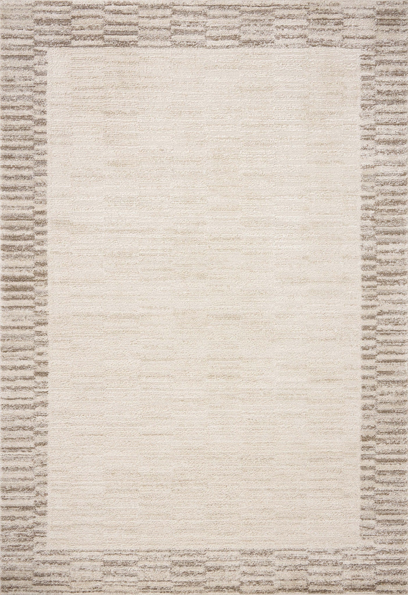 Calvin Ivory / Pebble — a Loloi rug at Laurie Yapp Home.