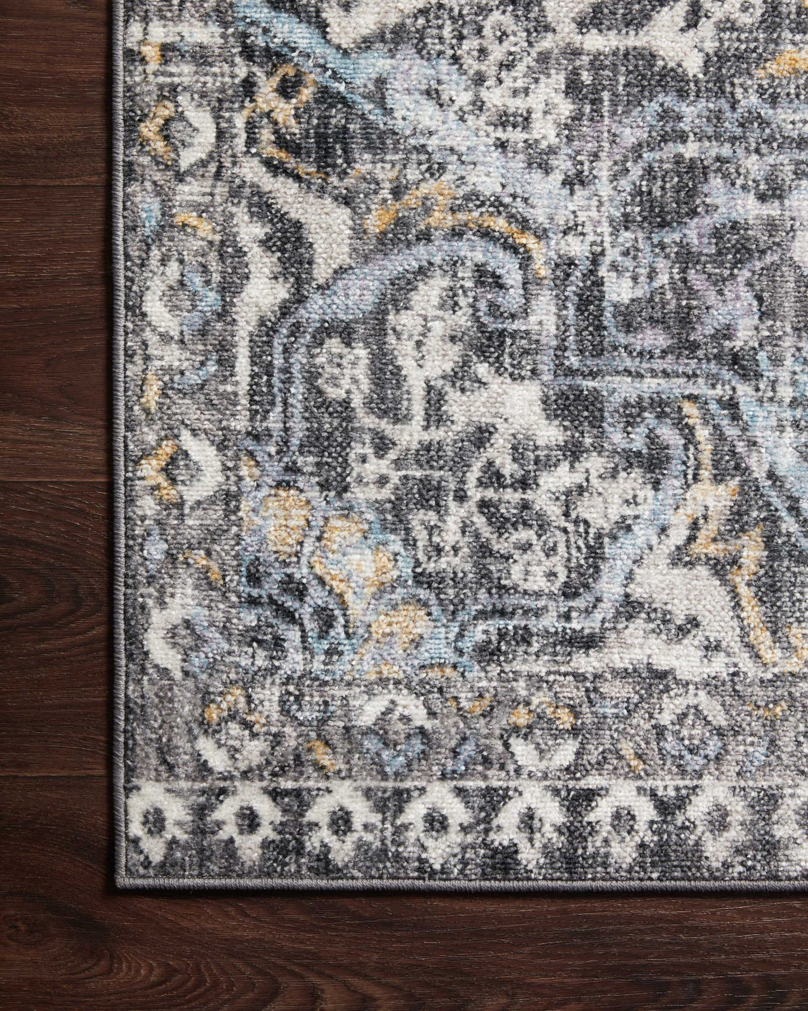 Cassandra Charcoal / Gold shown from another angle.