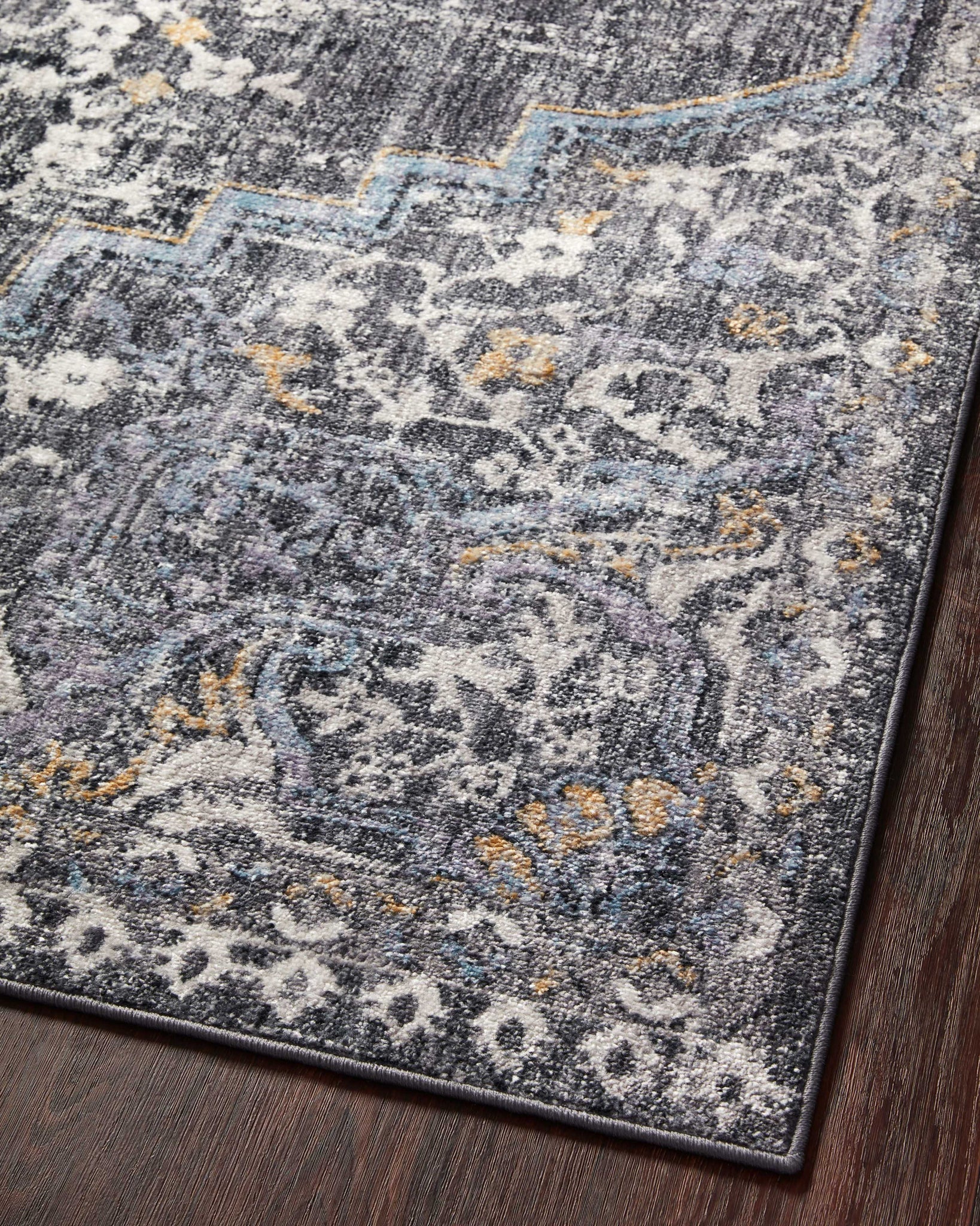 Cassandra Charcoal / Gold shown from another angle.