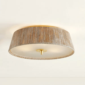 George Semi Flush in aged brass shown from the front to reveal the shade profile and mounting canopy.
