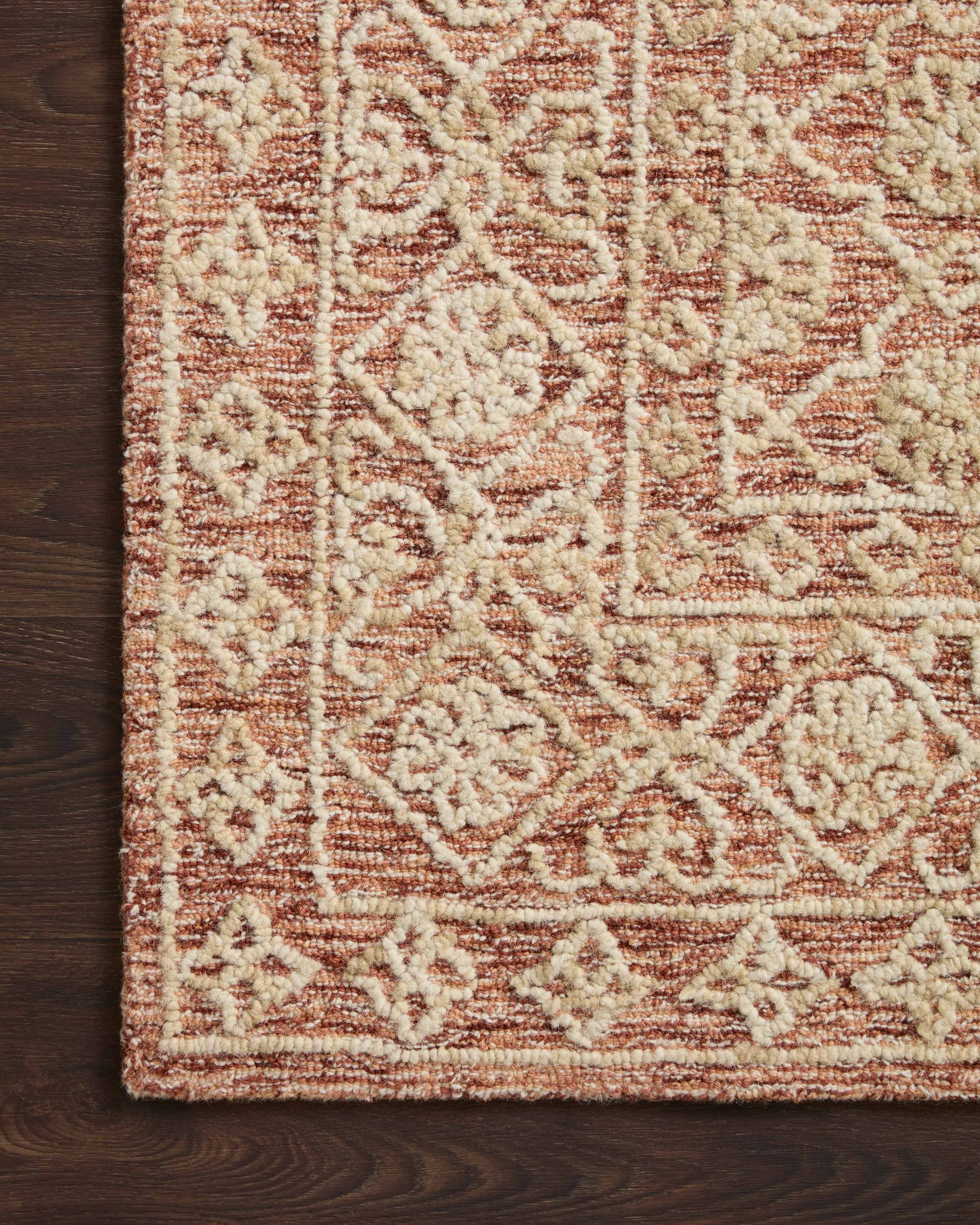 Close-up detail of the Cecelia Rust / Natural showing its pile and weave.