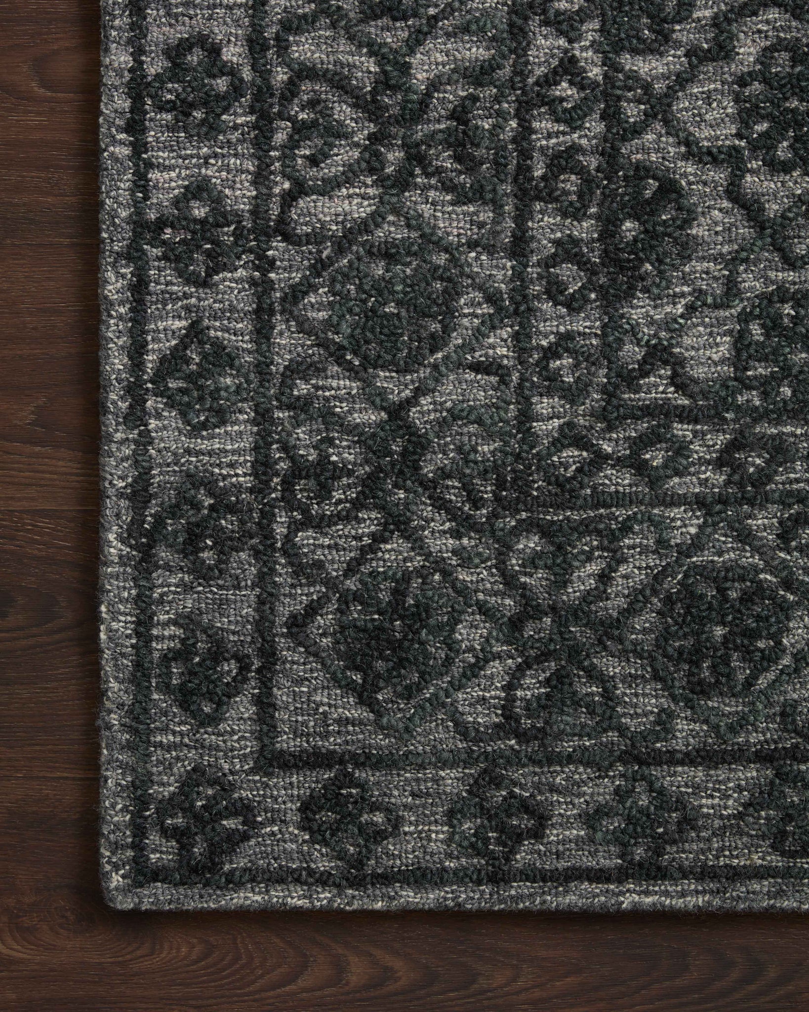 Side view of the Cecelia Smoke / Dk. Grey rug.
