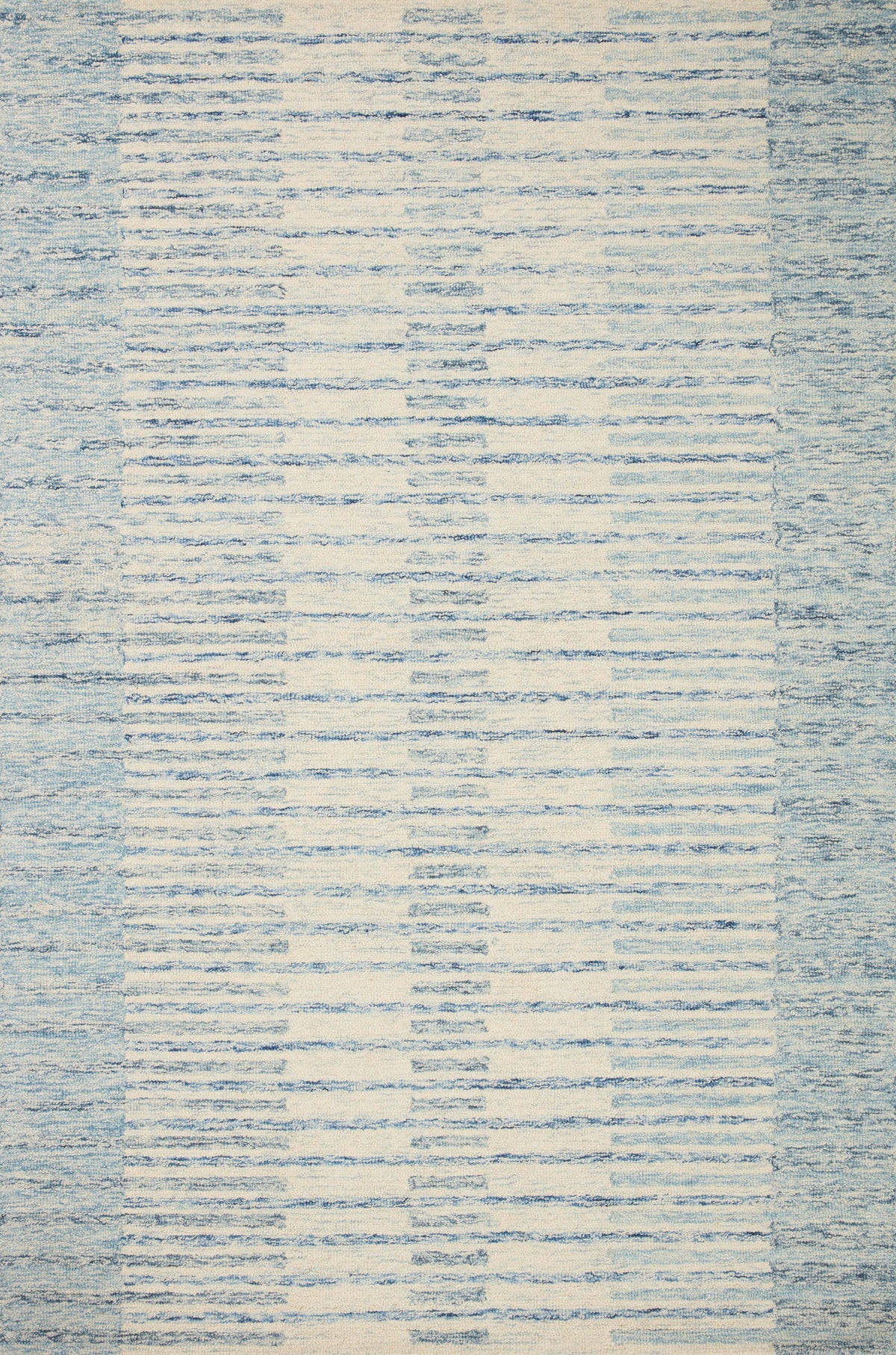 Chris Ivory / Denim — a Loloi rug at Laurie Yapp Home.