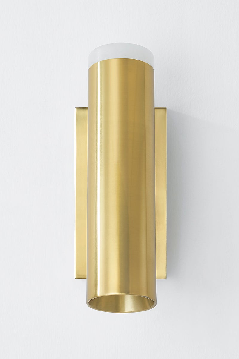 Clark Wall Sconce in aged brass shown from a second angle to highlight the arm curve and shade silhouette.