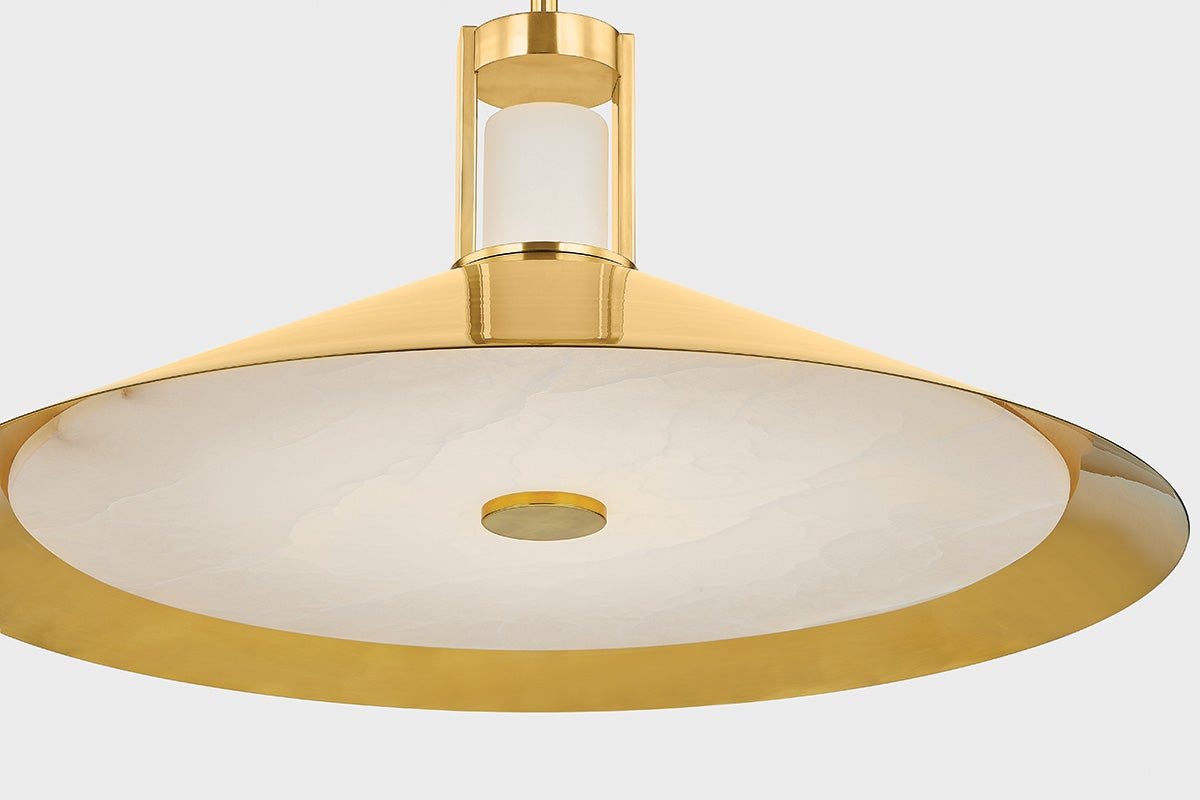 Close-up of the Clermont Pendant 20" in aged brass showing the shade shape and metal detail.