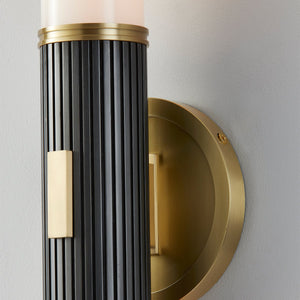 Close-up of the Crewe Wall Sconce 5" x 26.25" showing the arm curve and shade silhouette.