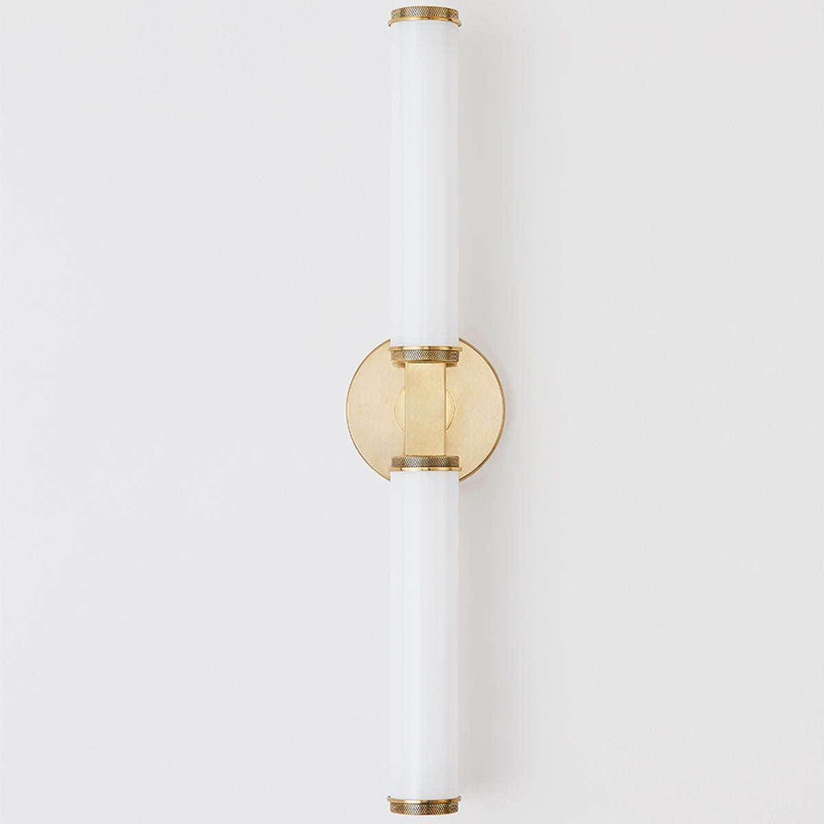 Close-up of the Cromwell Wall Sconce 4.75" x 22.75" in aged brass showing the arm curve and shade silhouette.
