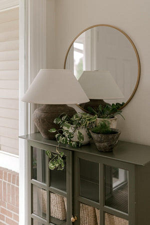 Calabria Table Lamp 20" styled in a curated console for warm, layered light at Laurie Yapp Home.