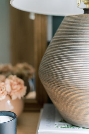 Calabria Table Lamp 16" styled in a curated console for warm, layered light at Laurie Yapp Home.