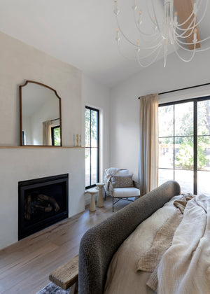 Cate Chandelier 42" styled in a two-story entry for warm, layered light at Laurie Yapp Home.