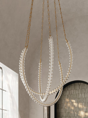 Celeste Chandelier 48.25" styled in an elegant dining room for warm, layered light at Laurie Yapp Home.