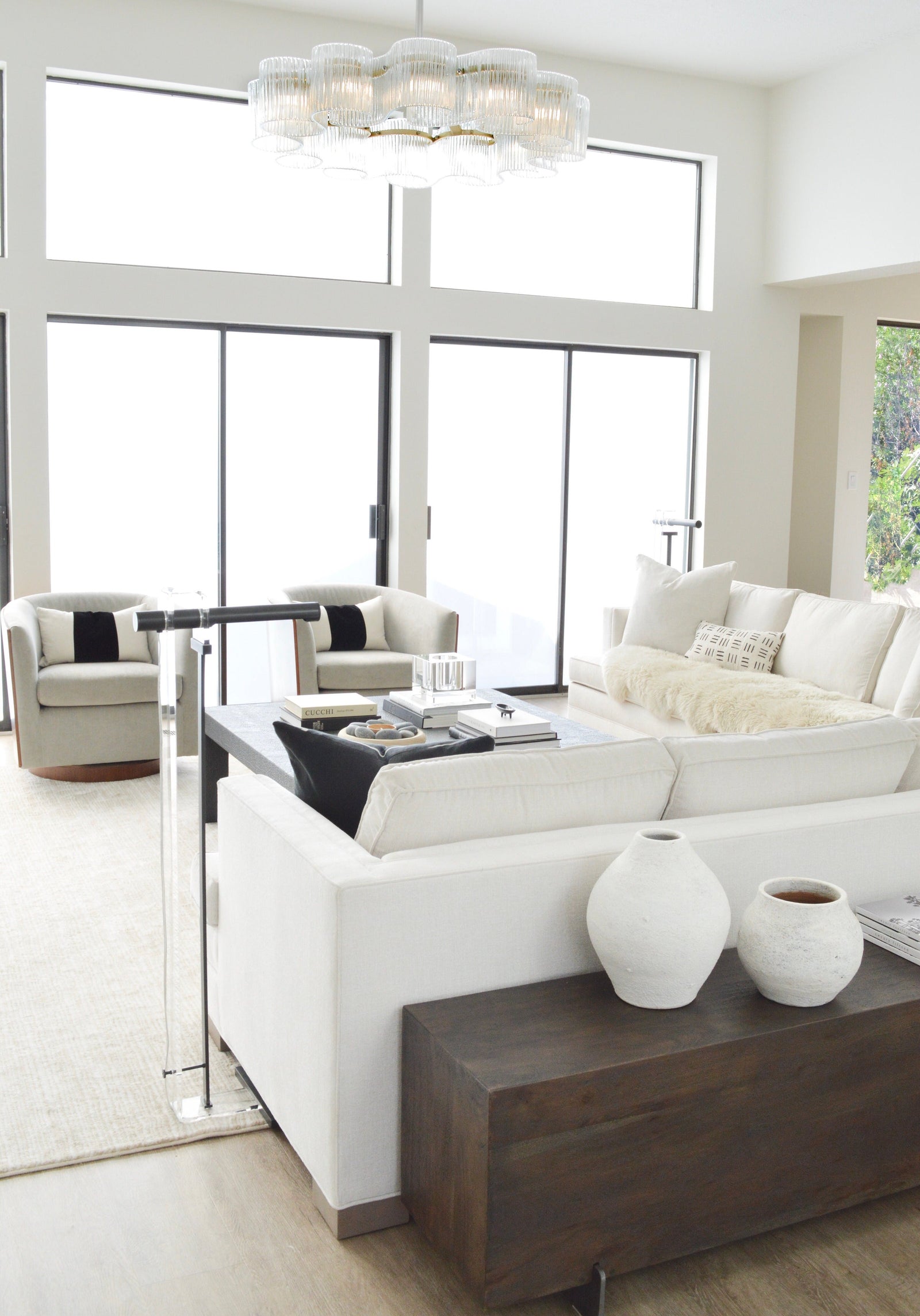 Circo Chandelier 45.5" x 12.25" — a Corbett chandelier for dining rooms, entries, and living rooms at Laurie Yapp Home.