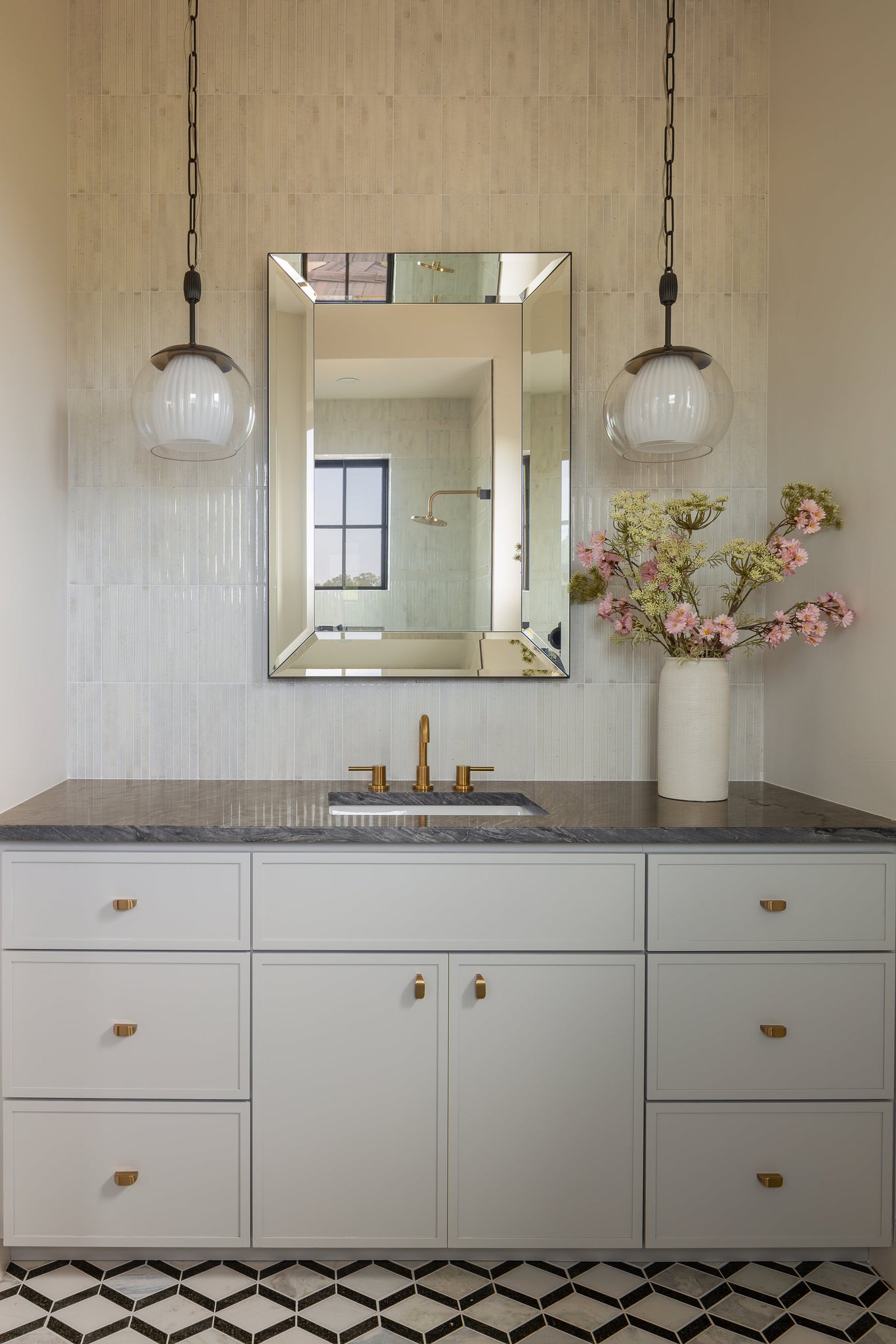 Clementon Pendant 17" in dark bronze styled in an elegant dining room for warm, layered light at Laurie Yapp Home.