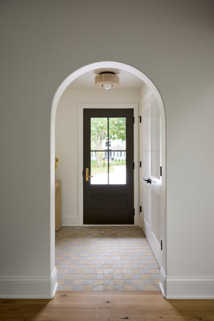 Coleman Flush Mount styled in a bedroom for warm, layered light at Laurie Yapp Home.