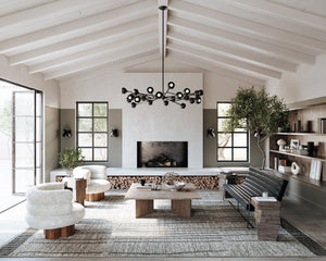 Colt Chandelier 54.5" styled in an elegant dining room for warm, layered light at Laurie Yapp Home.