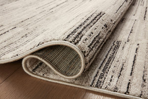 Close-up detail of the Darby Charcoal / Sand showing its pile and weave.