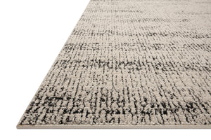 Side view of the Darby Oatmeal / Charcoal rug.