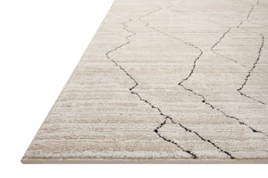 Side view of the Darby Sand / Charcoal rug.