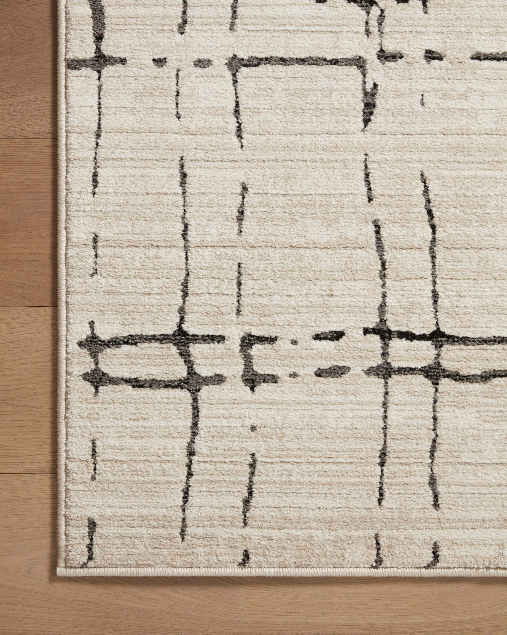 Darby Sand / Dk. Grey styled in a living room at Laurie Yapp Home.