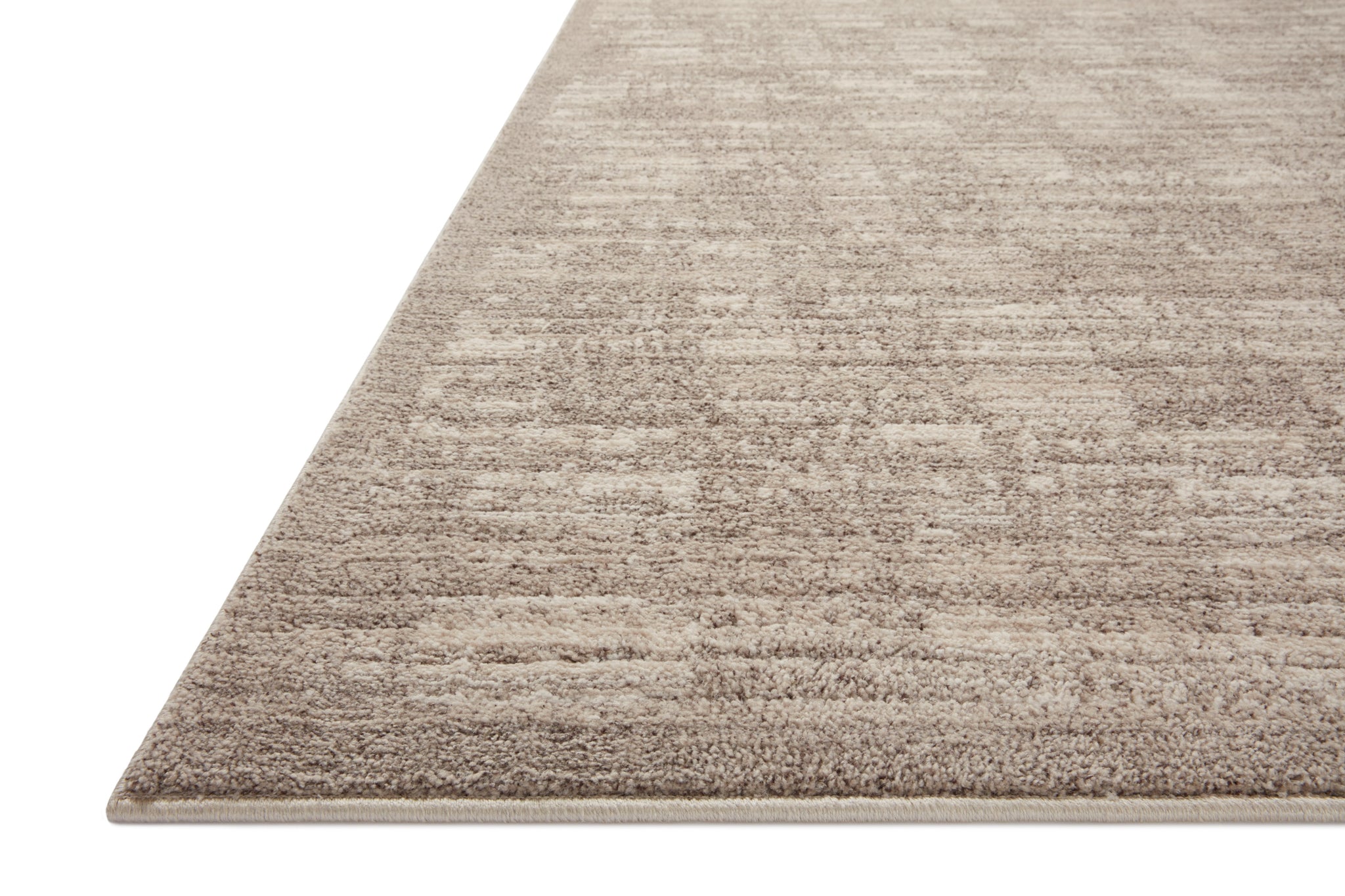 Side view of the Darby Pebble / Sand rug.