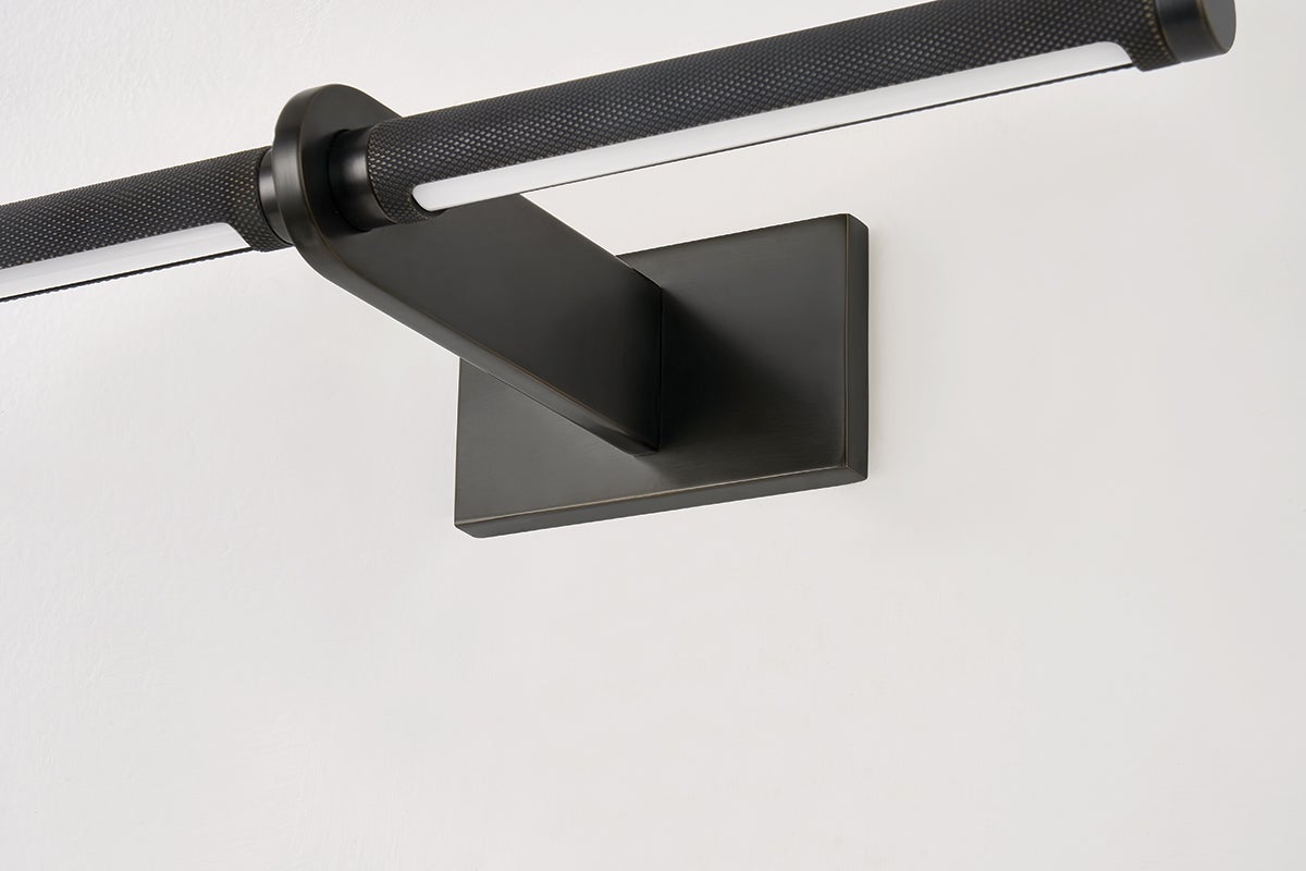 Close-up of the Deptford Picture Light 18" in dark bronze showing the arm curve and shade proportion.