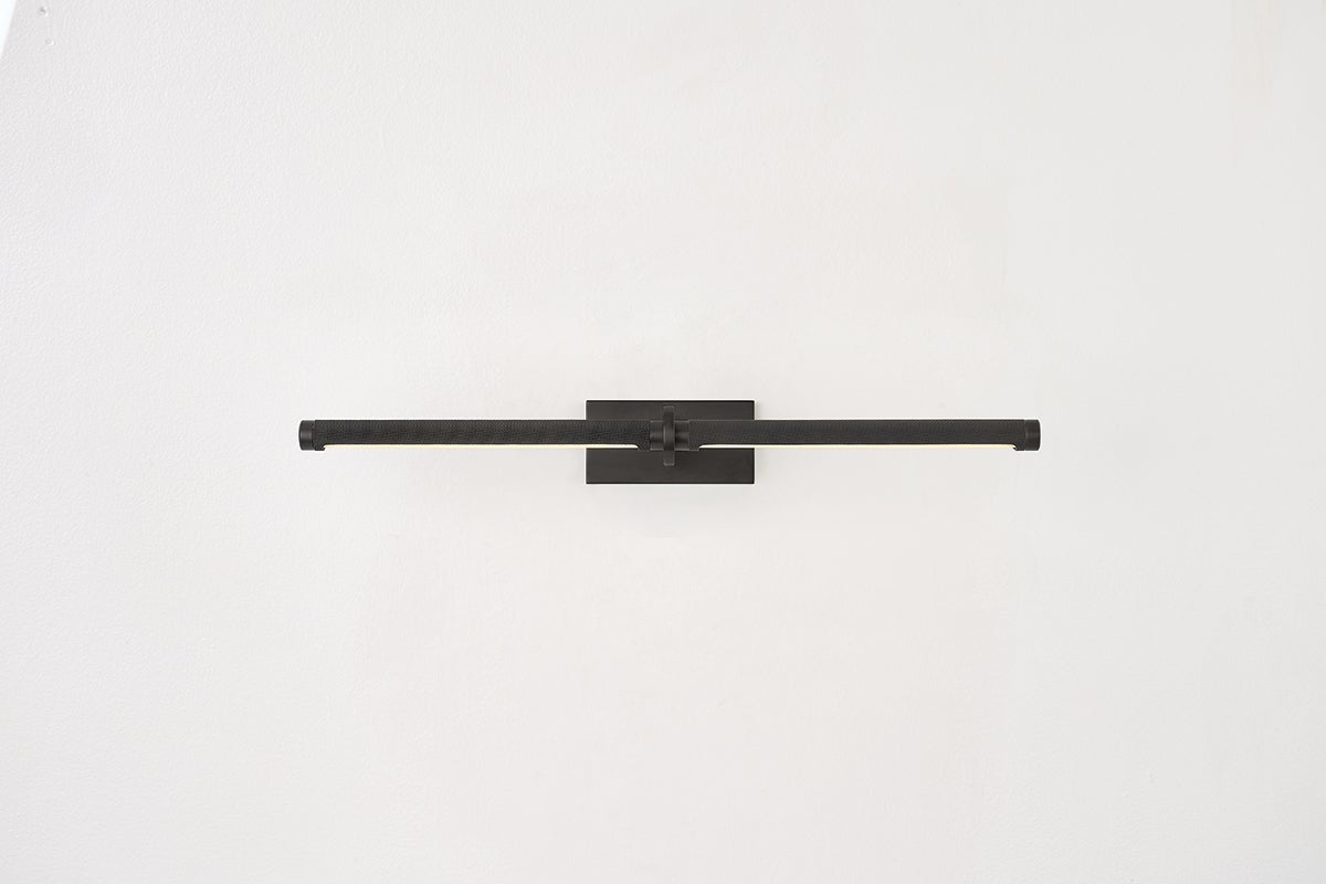 Close-up of the Deptford Picture Light 24" in dark bronze showing the arm curve and shade proportion.