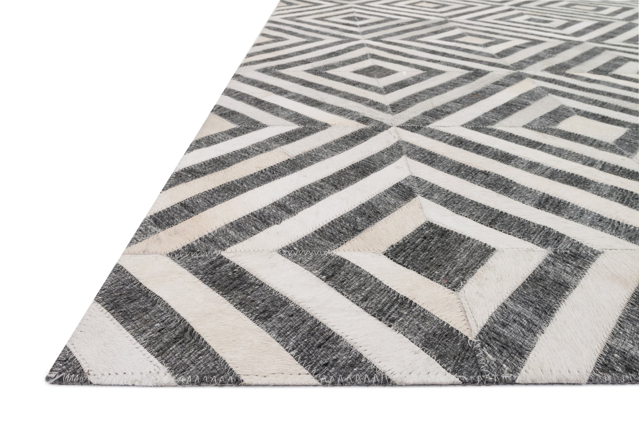 Side view of the Dorado Charcoal / Ivory rug.