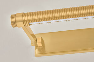 Close-up of the Duell Picture Light 18" in aged brass showing the arm curve and shade proportion.