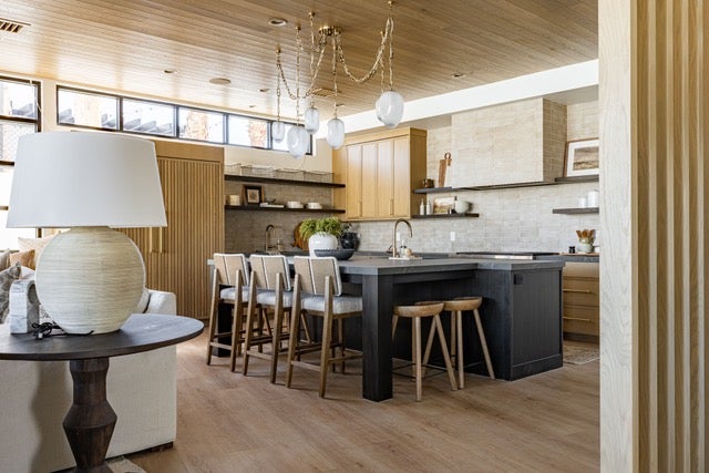 Daith Chandelier 61.25" styled in an elegant dining room for warm, layered light at Laurie Yapp Home.