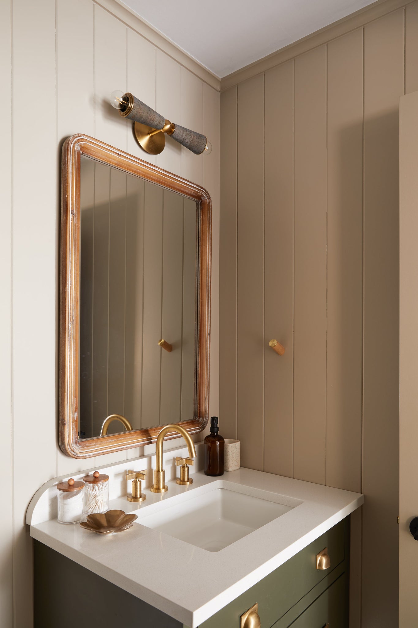Dax Wall Sconce 5" x 18.75" styled in a curated living room for warm, layered light at Laurie Yapp Home.