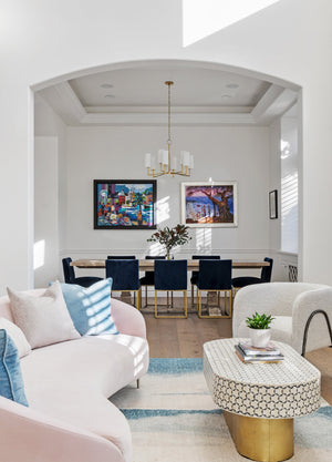 Dillon Chandelier 30" in aged brass styled in a formal living room for warm, layered light at Laurie Yapp Home.