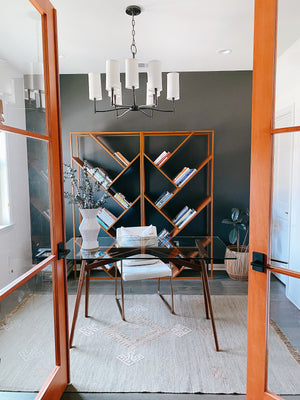Dillon Chandelier 30" in bronze styled in a two-story entry for warm, layered light at Laurie Yapp Home.