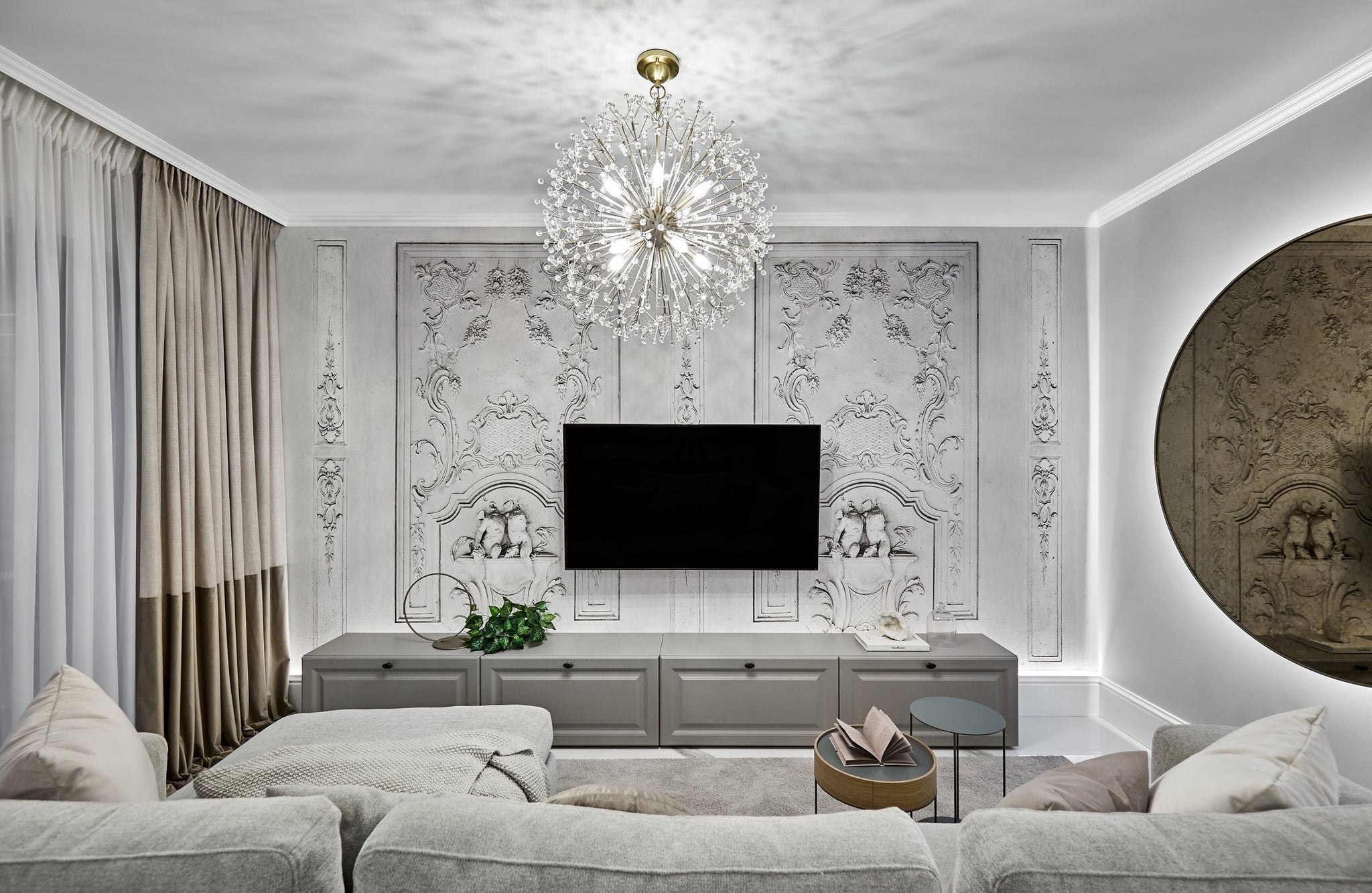 Dunkirk Chandelier 30" in aged brass styled in a formal living room for warm, layered light at Laurie Yapp Home.